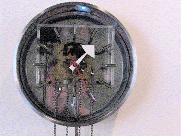 Howard Miller Chrome Wall Clock 