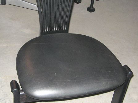 Six Wood and Leather Chairs 